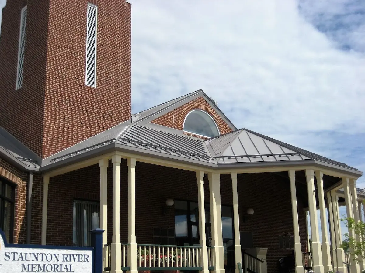 Skilled roofing craftsmen working on a residential roof in Bakers Crossroad